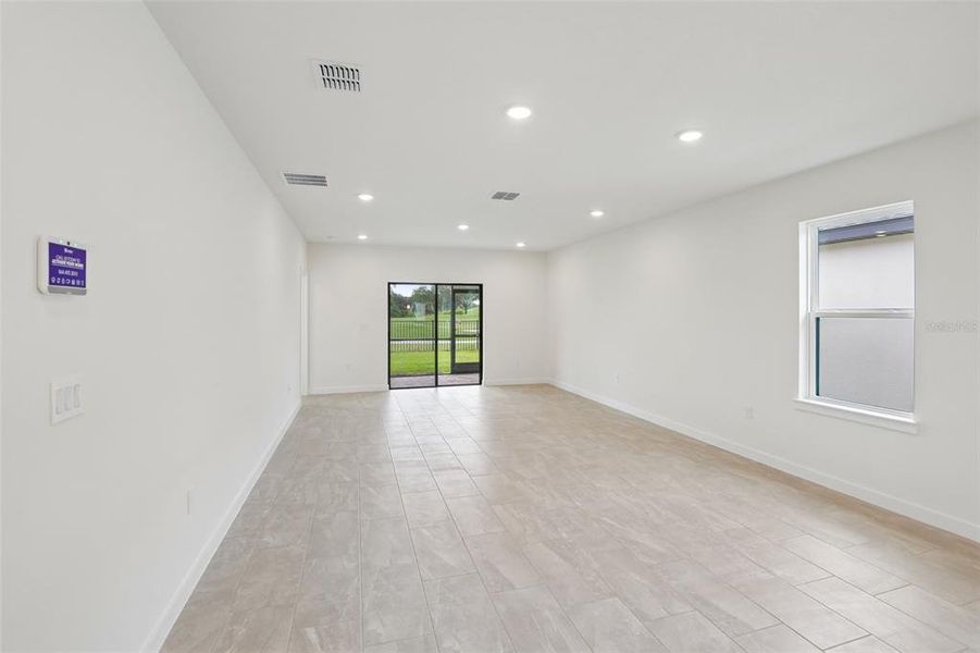 Spacious, unfurnished interior of a new home in Grasslands West, Lakeland (Image 29).