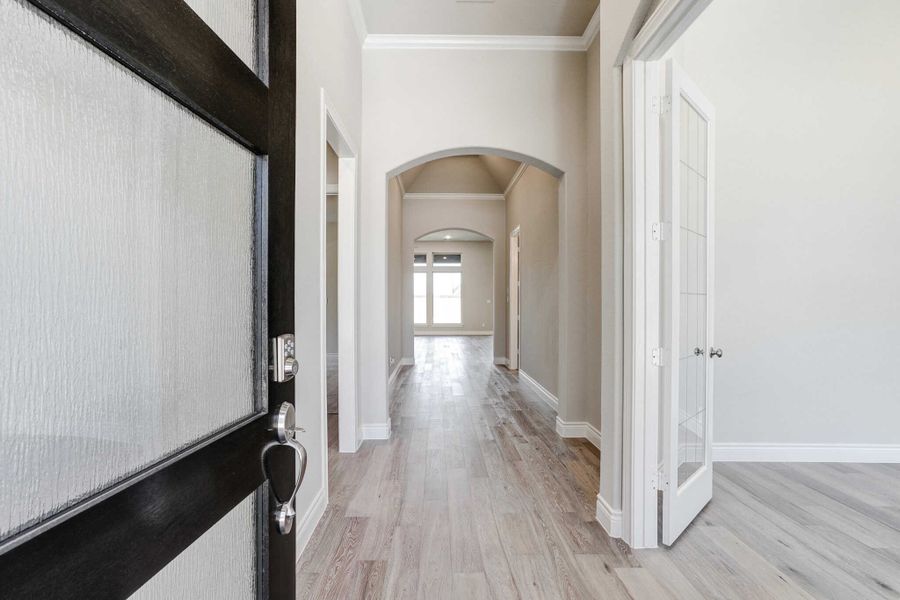 Representative unfurnished interior of a home built from the 2688 by Ravenna Homes in The Woodlands Hills 65′, Willis (Image 13).