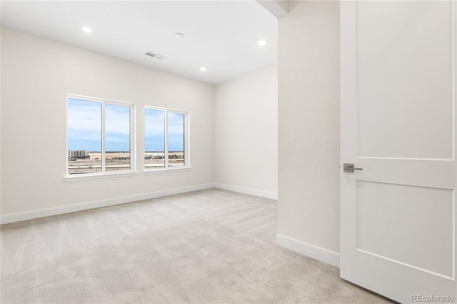 Spacious, unfurnished interior of a new home in Autograph at Lyric, Lone Tree (Image 42).