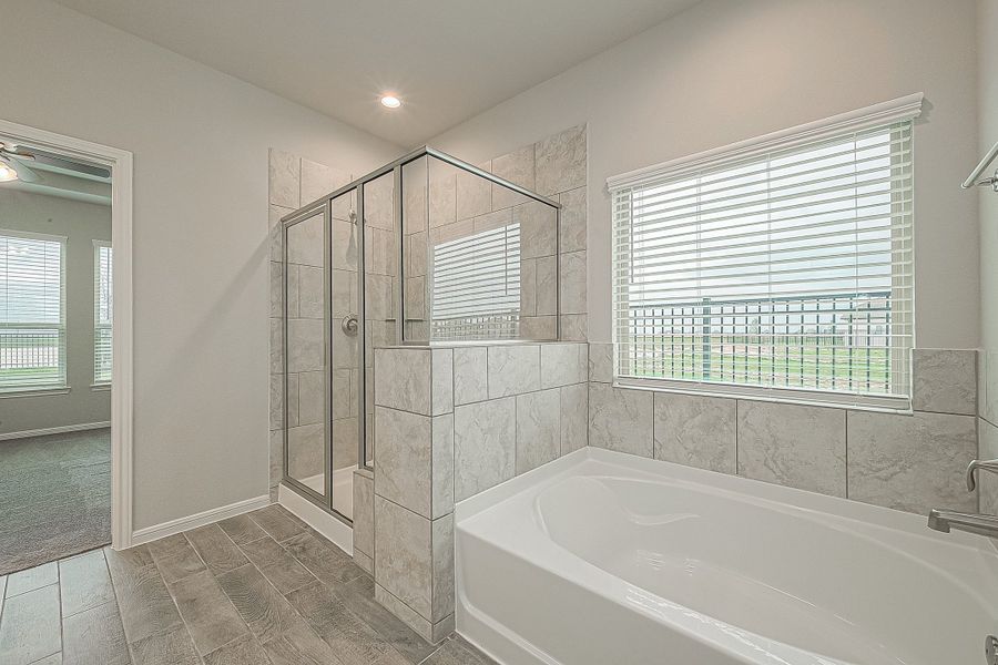 Representative furnished interior of a home built from the Floor Plan 2050 by Colina Homes in Grand Magnolia, Magnolia (Image 10).