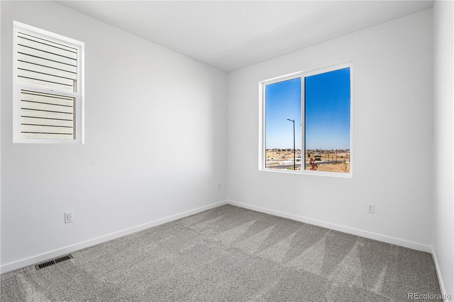 Spacious, unfurnished interior of a new home in Tribute at Lyric, Lone Tree (Image 24).