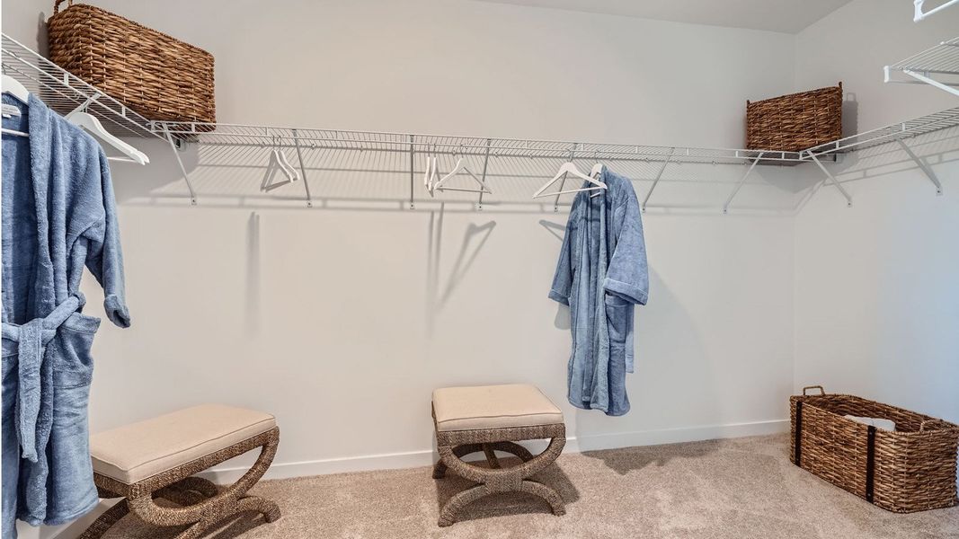 Representative furnished interior of a home built from the Grandcourt by D.R. Horton in Parker Pointe, Homestead (Image 31).