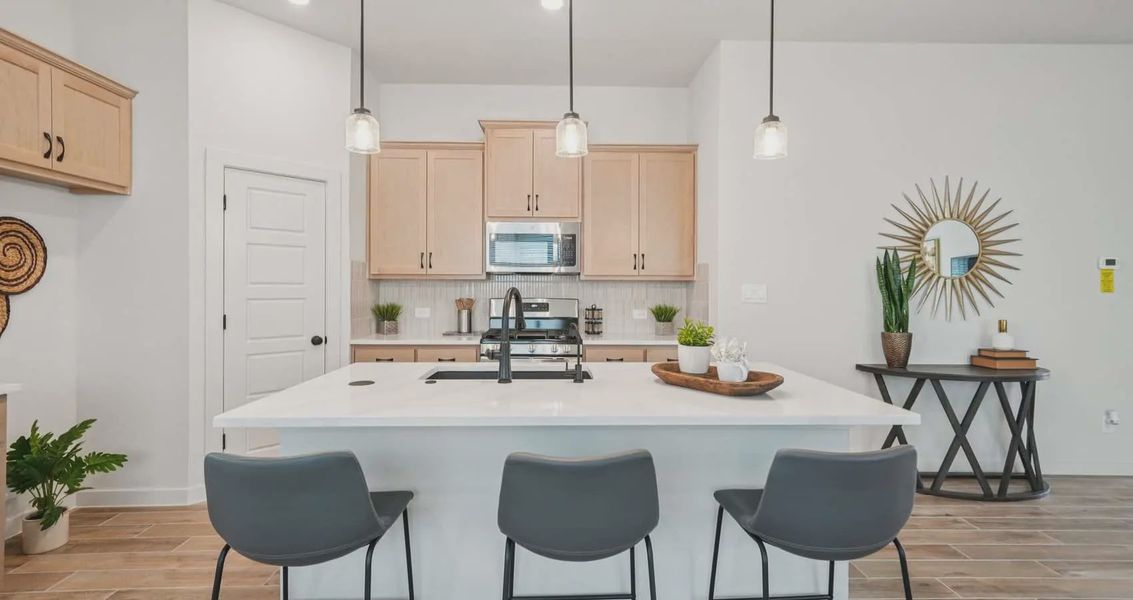 Furnished interior view inside a new home in Stream Waters, Buda (Image 6).