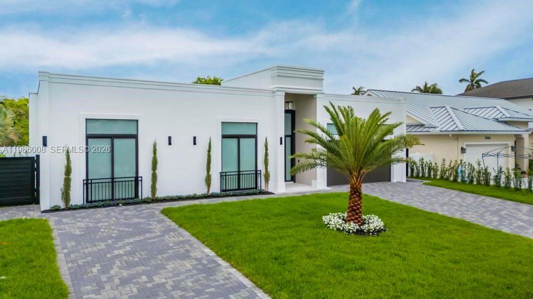 Front exterior of a new home in , Lighthouse Point, FL, highlighting curb appeal (Image 1). Front exterior of a new home in , Lighthouse Point, FL, highlighting curb appeal (Image 1).