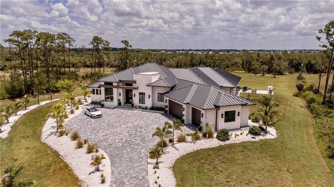 Front exterior of a new home in , Venice, FL, highlighting curb appeal (Image 1). Front exterior of a new home in , Venice, FL, highlighting curb appeal (Image 1).
