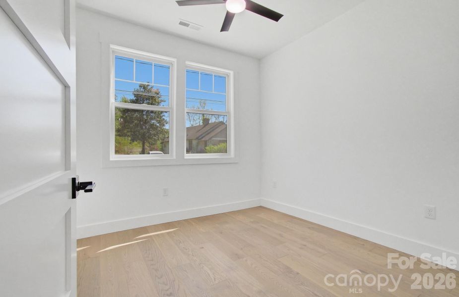 Spacious, unfurnished interior of a new home in , Hendersonville (Image 32).