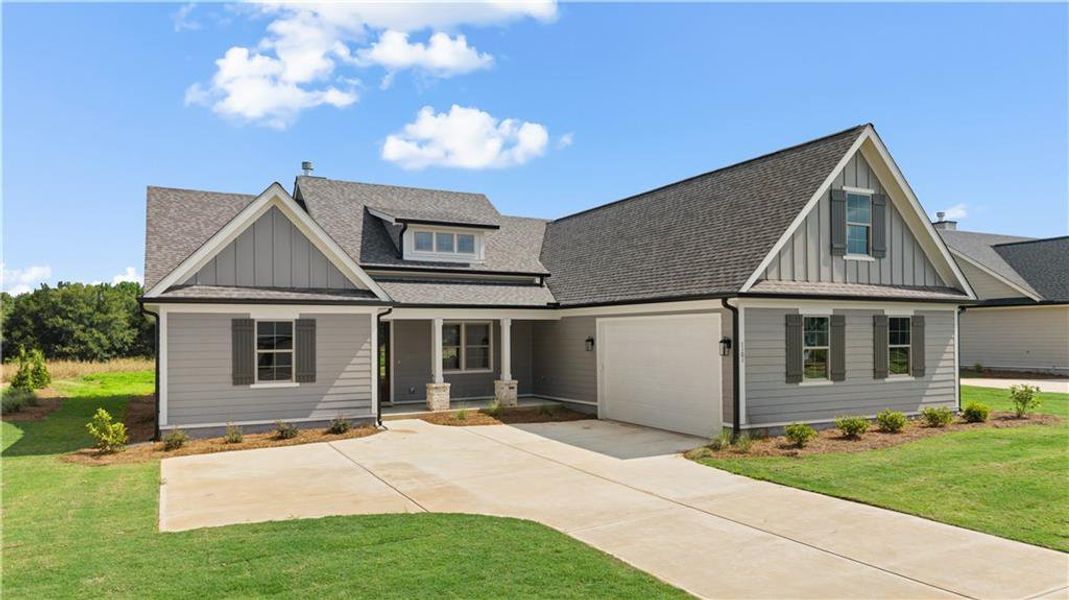 Front exterior of a new home in , Madison, GA, highlighting curb appeal (Image 1). Front exterior of a new home in , Madison, GA, highlighting curb appeal (Image 1).