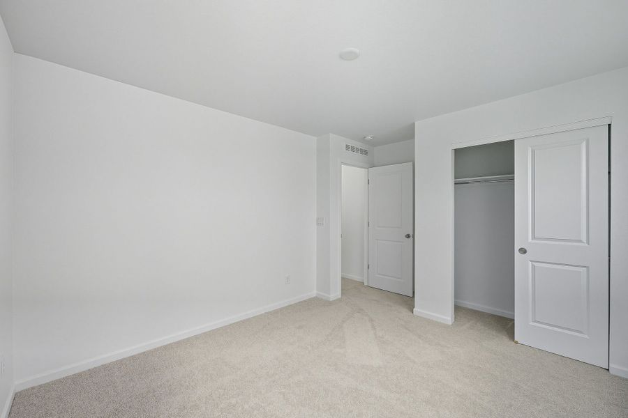 Spacious, unfurnished interior of a new home in The Town Collection at Independence, Elizabeth (Image 15).