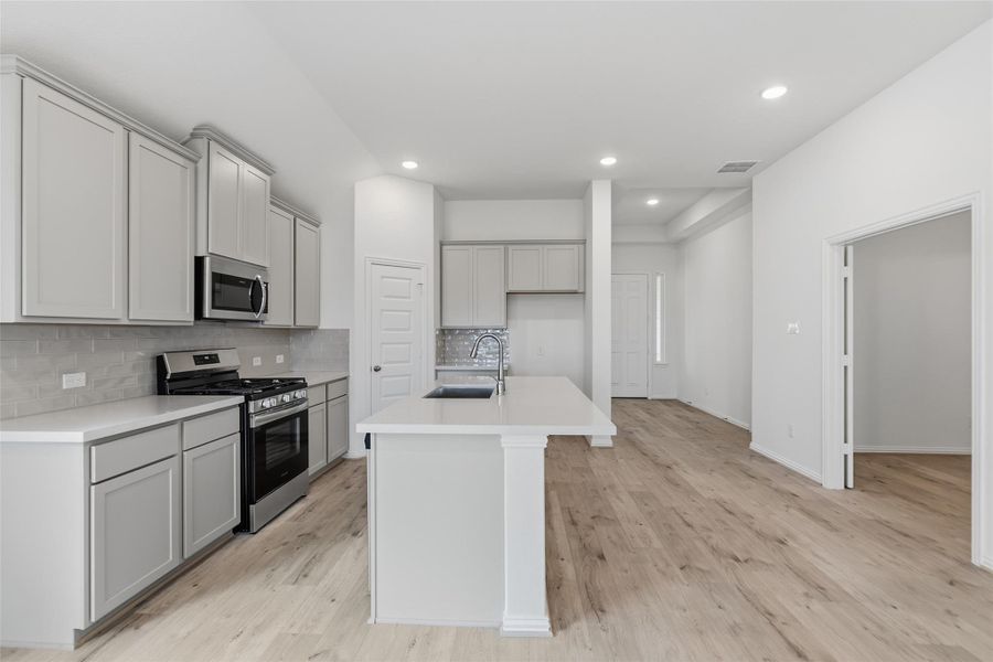 Furnished interior view inside a new home in Westland Ranch, League City (Image 8).