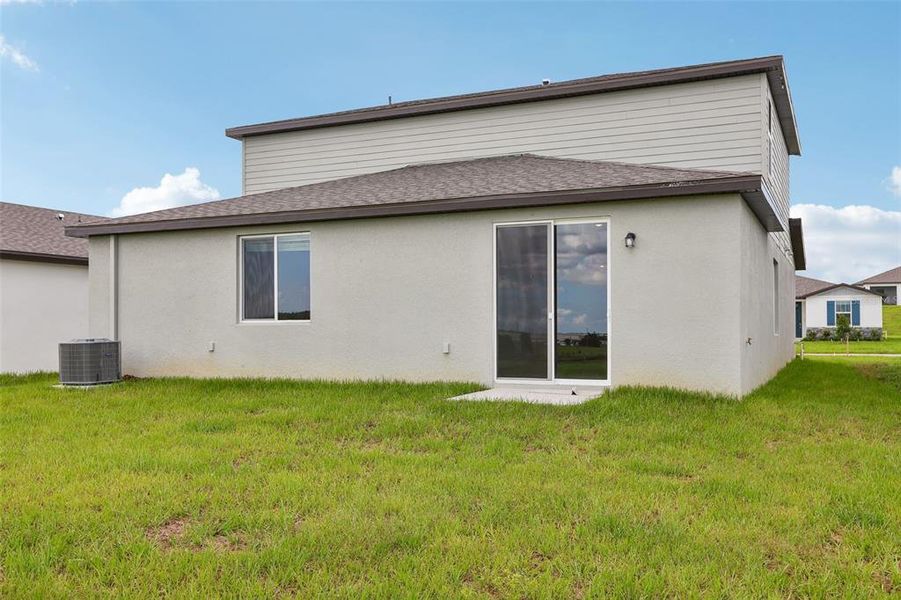 Exterior details and patio area of a home in Benton Hills - Classic Series, Brooksville (Image 3).