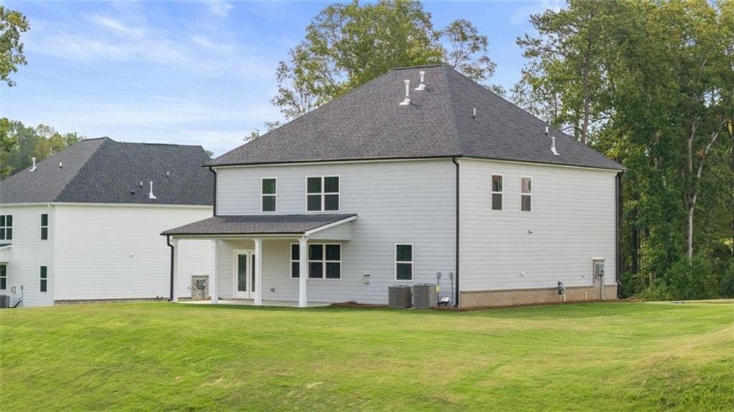Exterior details and patio area of a home in Independence, Loganville (Image 3).