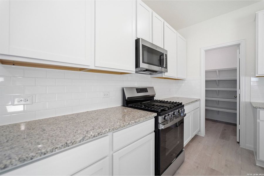 Furnished interior view inside a new home in Garden Grove, San Antonio (Image 6).