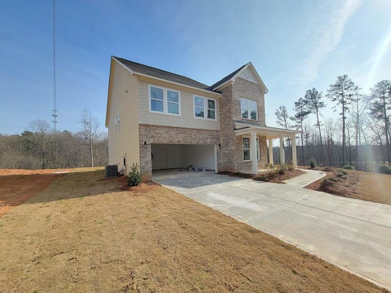 Exterior details and patio area of a home in The Estates at Casteel, Bethlehem (Image 11).