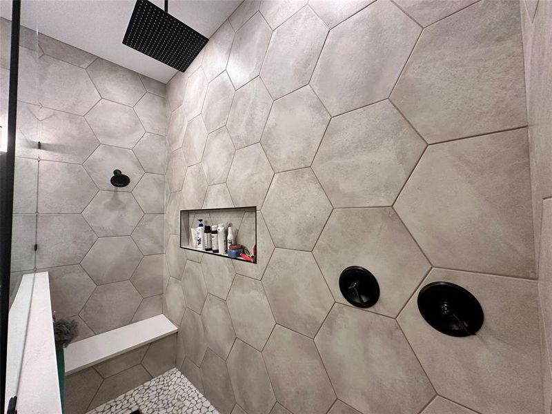 Walk-in shower in the primary bath. Rain shower head