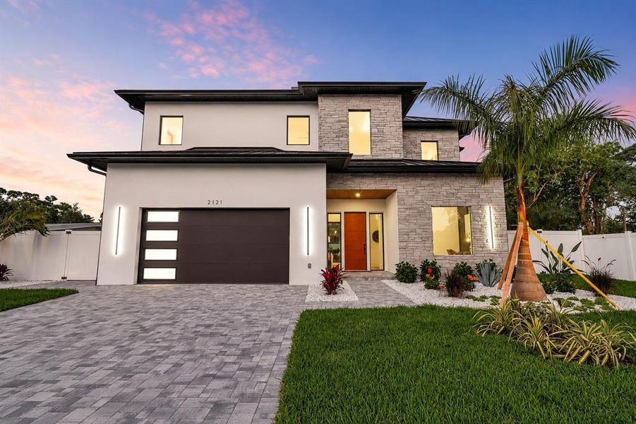Front exterior of a new home in , Sarasota, FL, highlighting curb appeal (Image 25).