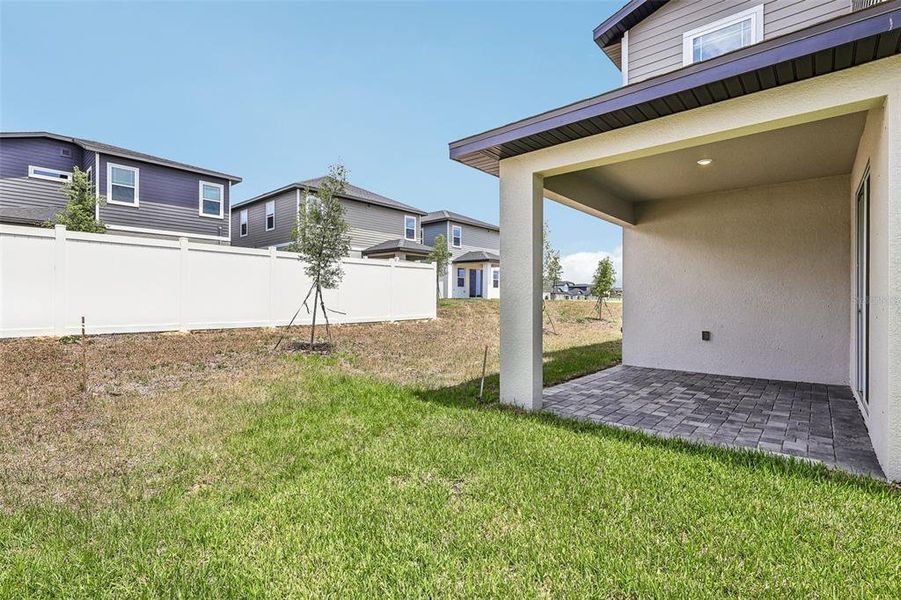 Exterior details and patio area of a home in Cyrene at Minneola, Minneola (Image 3).
