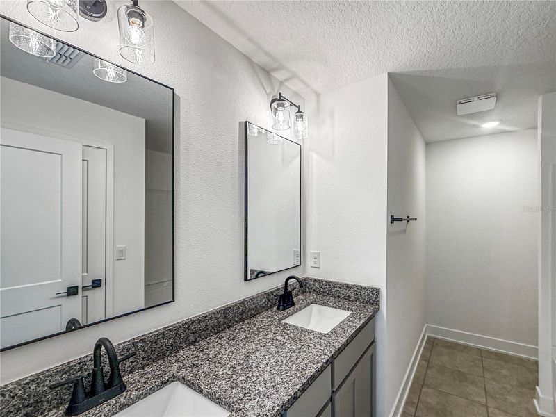 Furnished interior view inside a new home in Harmony Central, St. Cloud (Image 6).