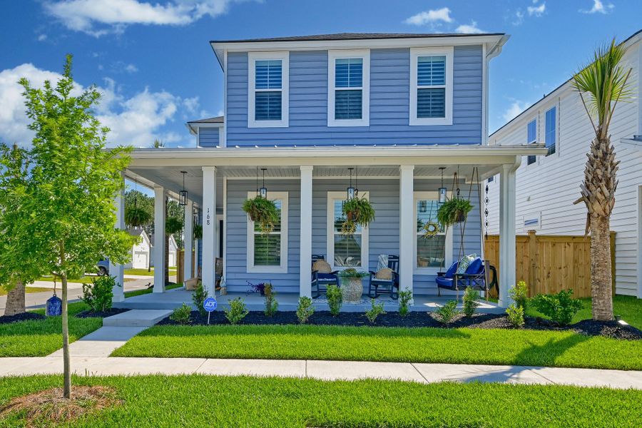 Exterior details and patio area of a home in Heron's Walk at Summers Corner, Summerville (Image 29).