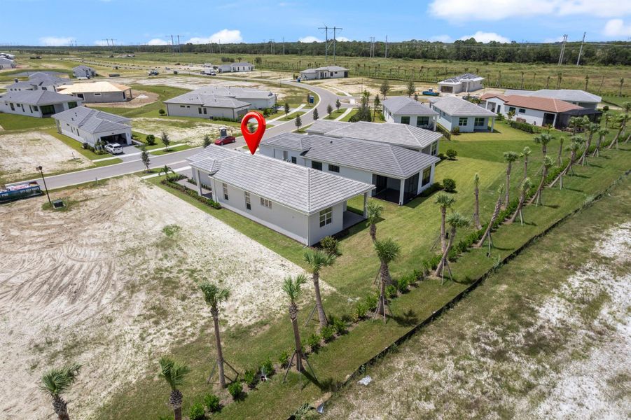Exterior details and patio area of a home in PGA Village Verano, Port St. Lucie (Image 3).