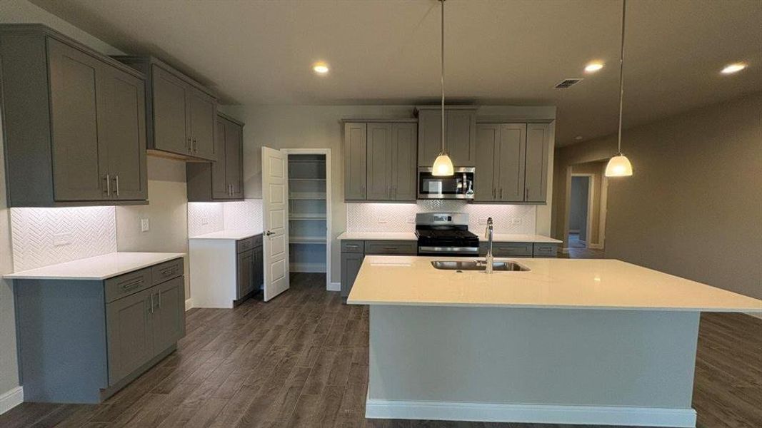 Kitchen - All Home and community information, including pricing, included features, terms, availability and amenities, are subject to change at any time without notice or obligation. All Drawings, pictures, photographs, video, square footages, floor plans, elevations, features, colors and sizes are approximate for illustration purposes only and will vary from the homes as built. Kitchen - All Home and community information, including pricing, included features, terms, availability and amenities, are subject to change at any time without notice or obligation. All Drawings, pictures, photographs, video, square footages, floor plans, elevations, features, colors and sizes are approximate for illustration purposes only and will vary from the homes as built.