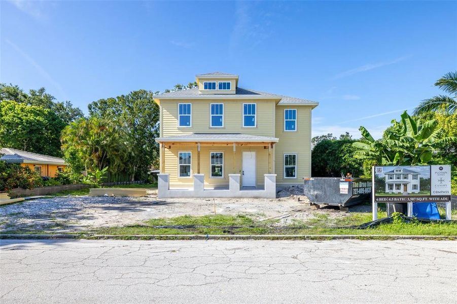 Front exterior of a new home in , St. Petersburg, FL, highlighting curb appeal (Image 1).