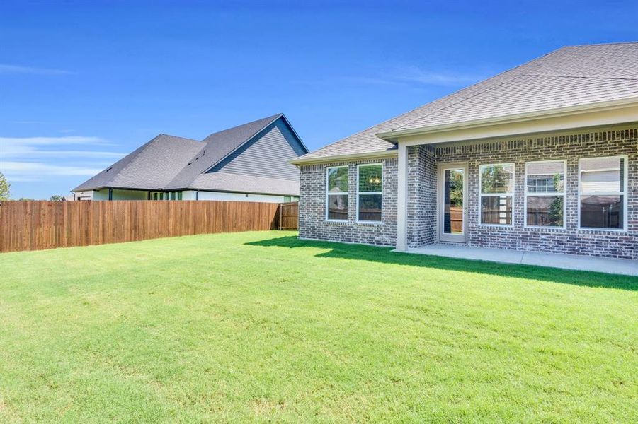 Front exterior of a new home in Ten Mile Creek Estates, DeSoto, TX, highlighting curb appeal (Image 21). Front exterior of a new home in Ten Mile Creek Estates, DeSoto, TX, highlighting curb appeal (Image 21).