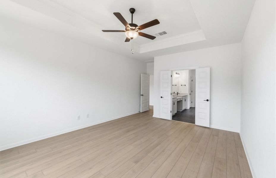 Spacious, unfurnished interior of a new home in West Cypress Hills, Spicewood (Image 38).