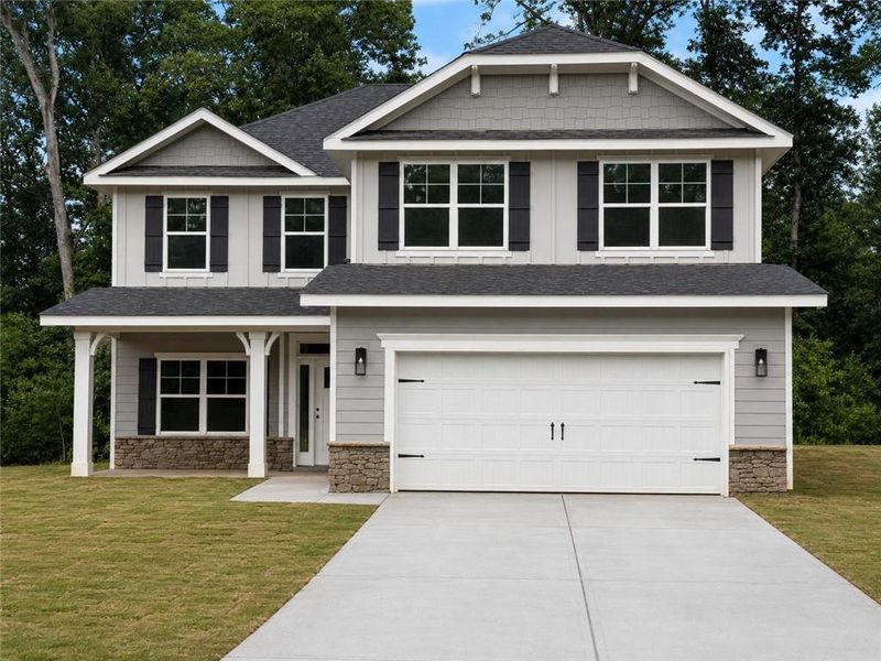 Front exterior of a new home in Thunder Ridge, Dawsonville, GA, highlighting curb appeal (Image 1). Front exterior of a new home in Thunder Ridge, Dawsonville, GA, highlighting curb appeal (Image 1).