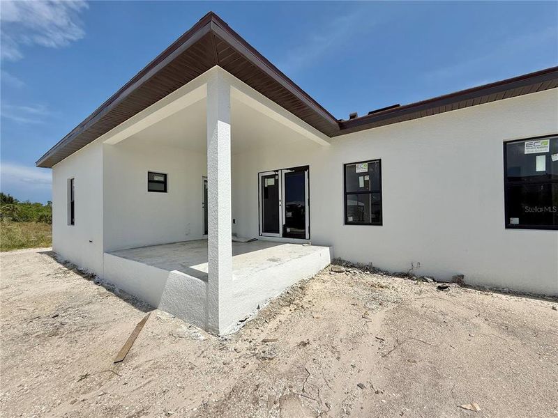 Exterior details and patio area of a home in , Port Charlotte (Image 3).