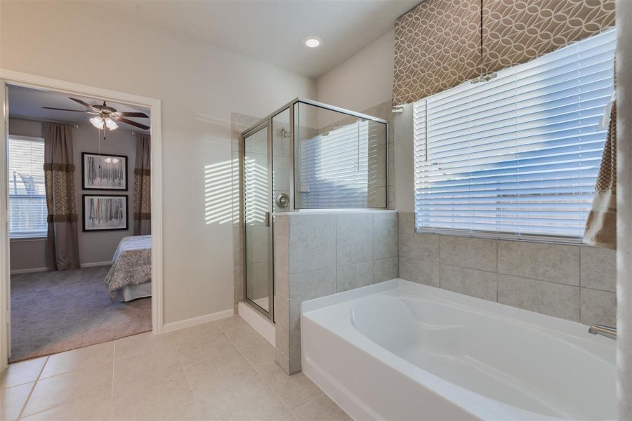 Furnished interior view inside a new home in Sunterra, Katy (Image 5).