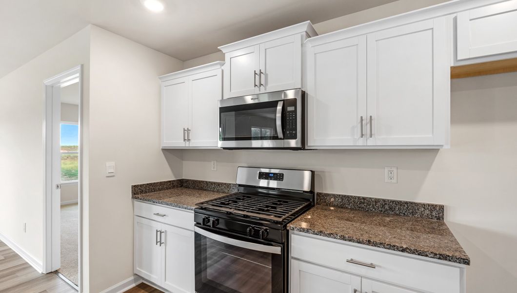 Furnished interior view inside a new home in Waverly Station, Greenwood (Image 6).