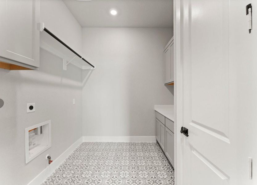 Utility Room with Washer and Dryer Connections, Drying Bar, Folding Area, and Storage Utility Room with Washer and Dryer Connections, Drying Bar, Folding Area, and Storage