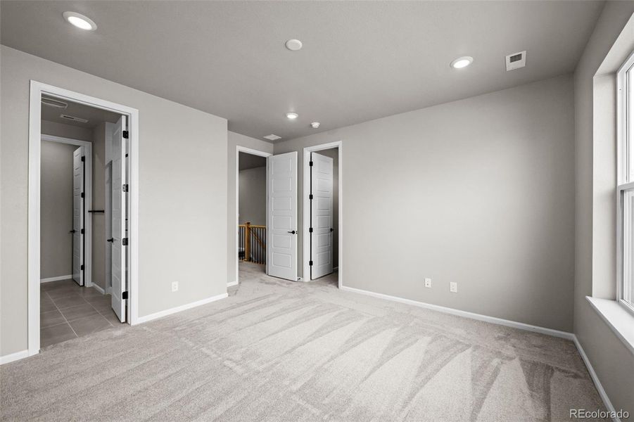 Spacious, unfurnished interior of a new home in Ralston Creek, Arvada (Image 24).
