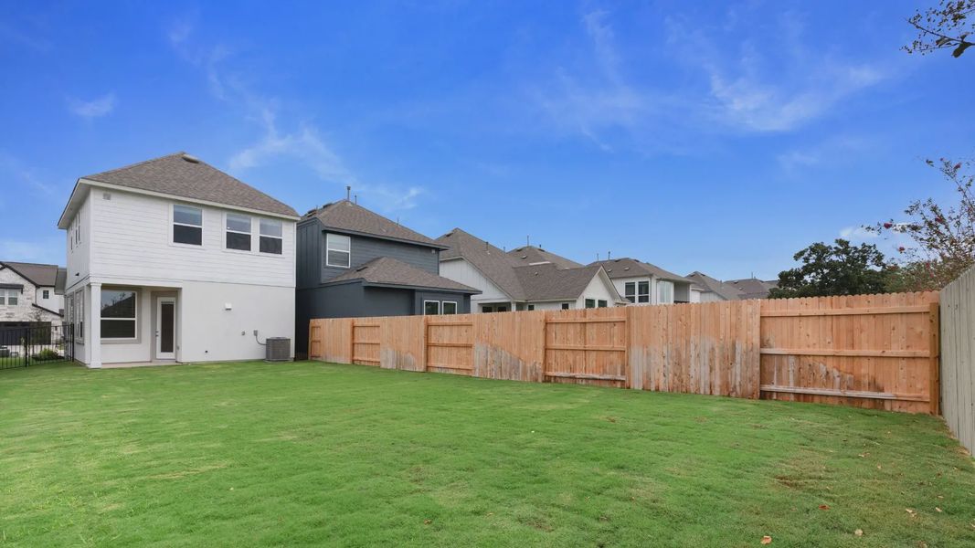Exterior details and patio area of a home in Santa Rita Ranch, Liberty Hill (Image 4).