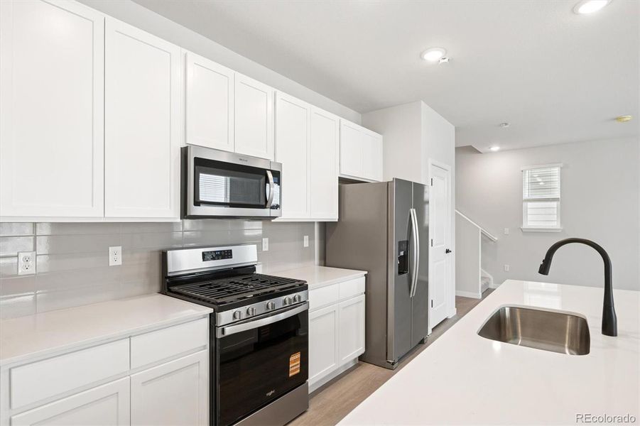 Furnished interior view inside a new home in Coyote Creek, Fort Lupton (Image 12).