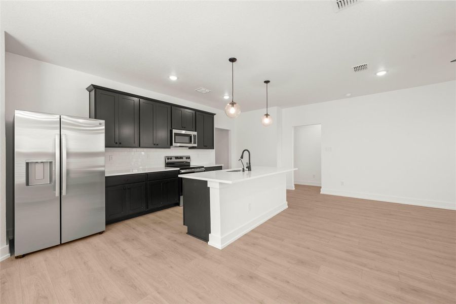 Furnished interior view inside a new home in Rancho San Gabriel, Georgetown (Image 10).