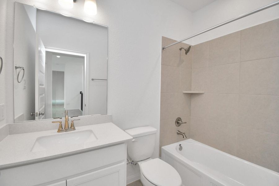 Furnished interior view inside a new home in Elyson, Katy (Image 10).