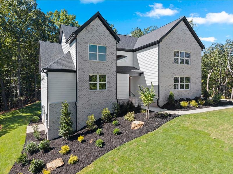 Front exterior of a new home in , Baldwin, GA, highlighting curb appeal (Image 34).