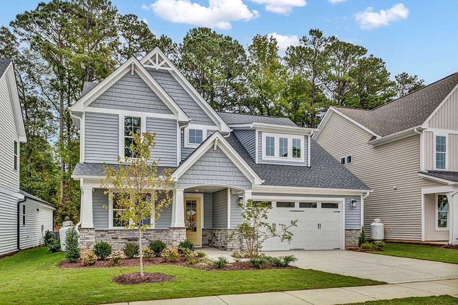 Representative exterior photo of a completed home built from the The Whitley by RobuckHomes in Windwater, Hampstead, NC (Image 26).