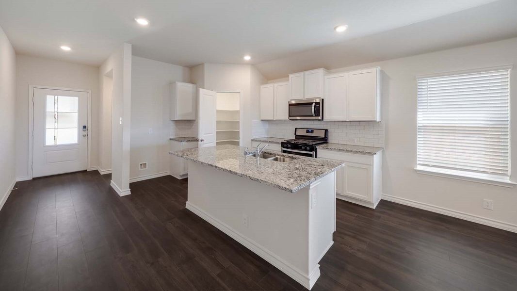 Furnished interior view inside a new home in Tamarron, Fulshear (Image 5).