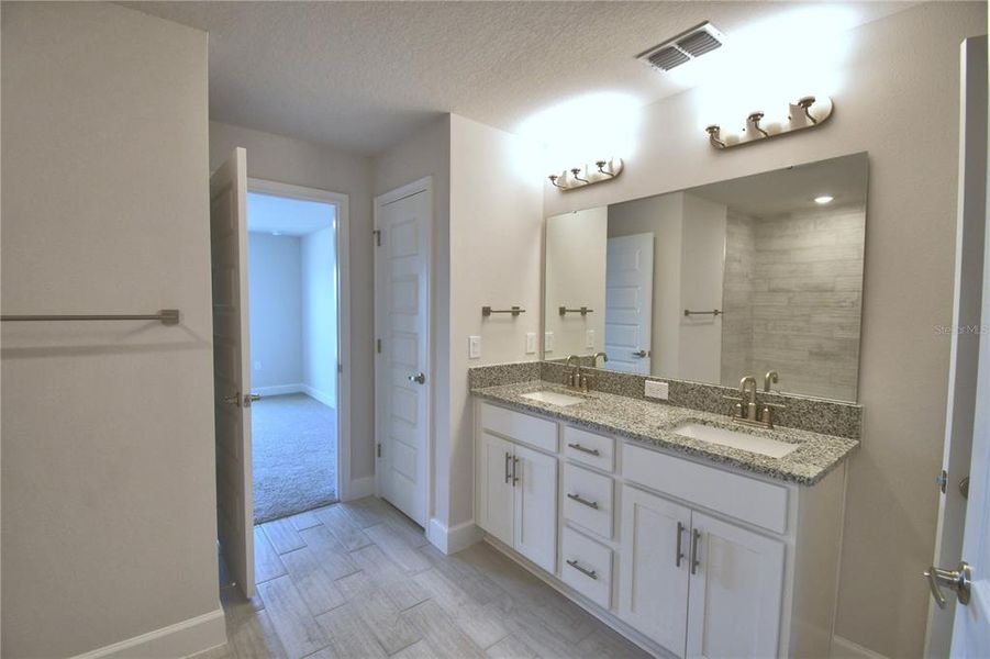 Furnished interior view inside a new home in Cadence Crossing, Auburndale (Image 15). Furnished interior view inside a new home in Cadence Crossing, Auburndale (Image 15).