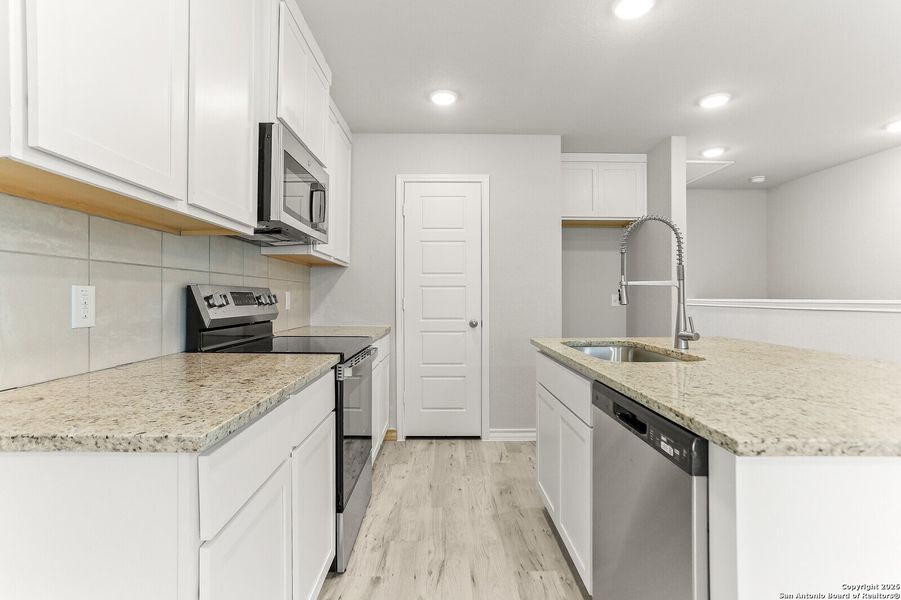 Furnished interior view inside a new home in , San Antonio (Image 5).