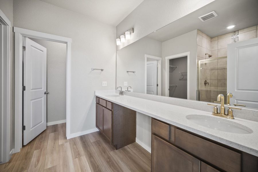 Representative furnished interior of a home built from the Lilac by View Homes in Aspen Ranch, Fountain (Image 30).