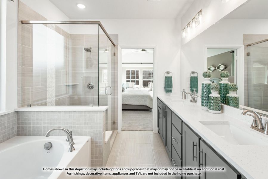 Master bathroom with double vanity, soaking tub, glass walk-in shower, and gray tile walls Master bathroom with double vanity, soaking tub, glass walk-in shower, and gray tile walls