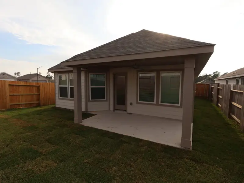 Exterior details and patio area of a home in Moran Ranch, Willis (Image 4).