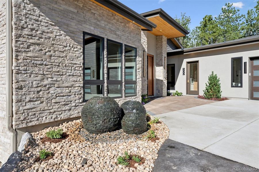 Front exterior of a new home in , Monument, CO, highlighting curb appeal (Image 2).