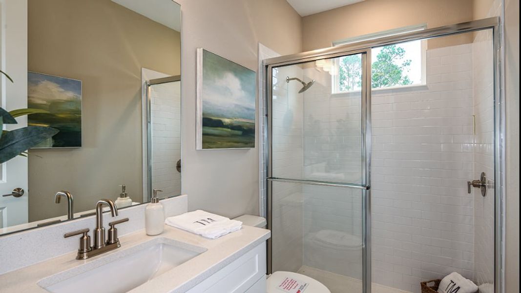 Representative furnished interior of a home built from the Armona by Taylor Morrison in Headwaters at Lofton Creek, Yulee (Image 27).
