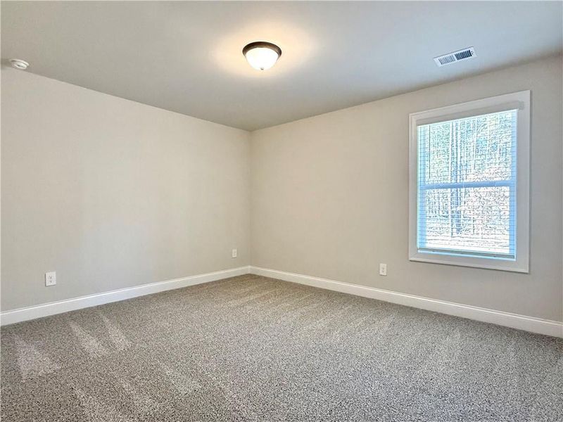 Spacious, unfurnished interior of a new home in Vines at Mill Creek - Legacy Series, Braselton (Image 27).