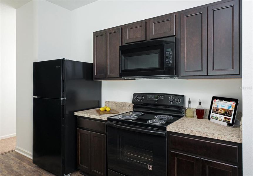 Furnished interior view inside a new home in Pinecone Reserve, Brooksville (Image 3). Furnished interior view inside a new home in Pinecone Reserve, Brooksville (Image 3).