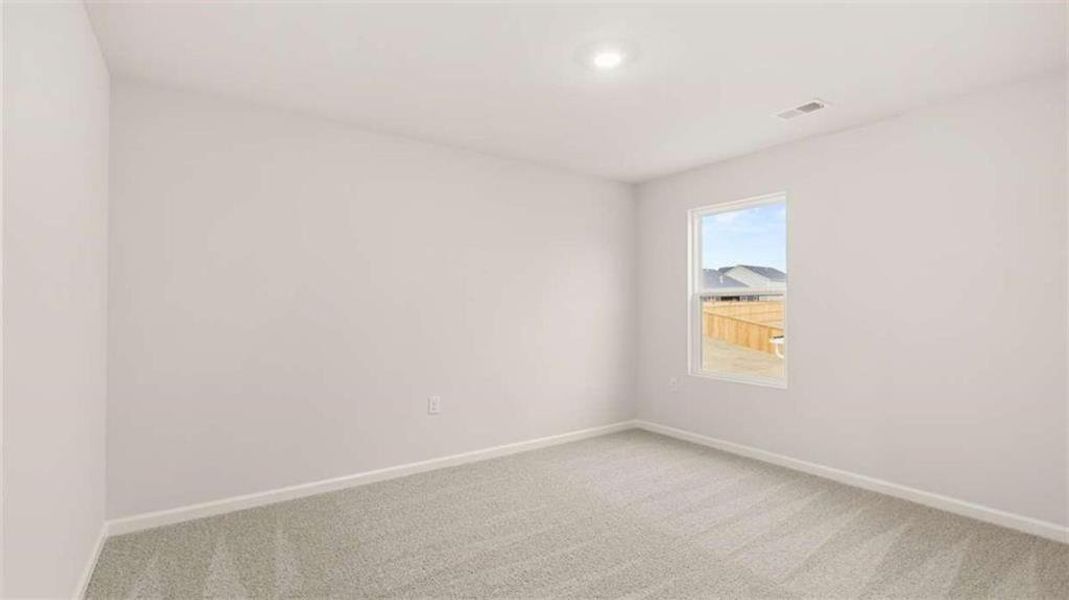 Spacious, unfurnished interior of a new home in Brooks Station, Dacula (Image 24).